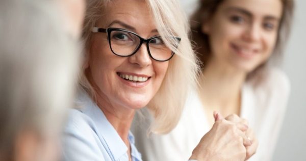 bigstock-Smiling-Aged-Businesswoman-In-230285455-scaled-e1728645764513-980x551